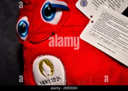 This photograph shows a plush toy representing the mascot of the Paris 2024 Olympic Games 'Les Phryges' with the mention 'Made in China' on November 15, 2022 in Paris, France - Photo Matthieu Mirville / DPPI Stock Photo