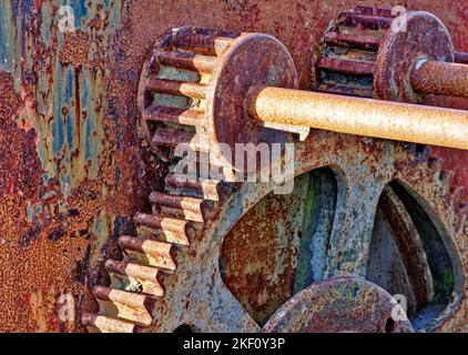 Old rusty or rusted toothed cog wheels Stock Photo