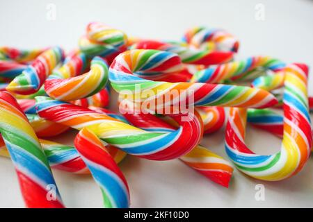 mini cherry candy canes on white background  Stock Photo