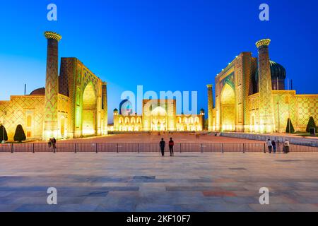 Registan Ulugh Beg Madrasah, Sher Dor Madrasa and Tilya Kori Madrassah is a parts of Registan ancient city, Samarkand in Uzbekistan Stock Photo