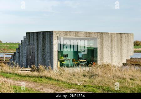 Zierikzee, The Netherlands, November 11, 2022: small office of Natuurmonumenten (Society for Nature Conservation) in the wetlands, just out of town Stock Photo
