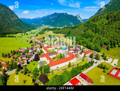 Ettal Abbey aerial panoramic view. Ettal Abbey is a Benedictine monastery in the village of Ettal close to Oberammergau and Garmisch-Partenkirchen in Stock Photo