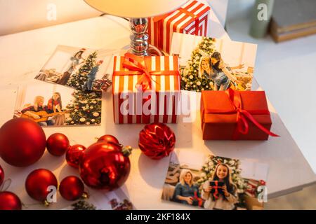 Photos of children against Christmas lights background Stock Photo