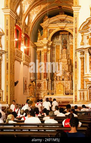 Salvador, Bahia, Brazil - May 26, 2016: Catholics are inside the Church praying on the day of homage to corpus christ, in the city of Salvador, Brazil Stock Photo