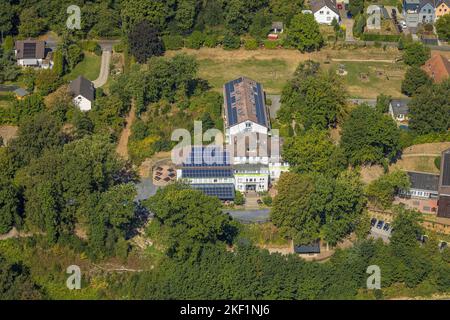 Aerial view, Haus Friede - EC guesthouse and conference center, solar roof, Oberbredenscheid, Hattingen, Ruhr area, North Rhine-Westphalia, Germany, D Stock Photo