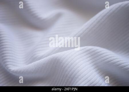 White wrinkled jersey, soft fabric background. Stock Photo