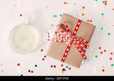 Perfume with a gift box for Valentine's Day. A gift idea for Valentine's Day Stock Photo