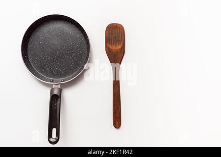 empty pan and flipper used in frying for cooking,kitchenware Stock Photo