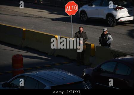 Tijuana, Baja California, Mexico. 15th Nov, 2022. Mexican immigration authorities along with national and municipal officers patrol a new checkpoint to prevent travelers crossing by car without valid documentation (a task currently performed by United States border officials) to prevent asylum seekers from driving into U.S. soil at the San Ysidro Port of Entry from Tijuana to San Diego, California on Tuesday, November 15, 2022. The pilot program started today with both the U.S. and Mexico cooperating in what has seen the nation's role increase even further in helping the control of mig Stock Photo