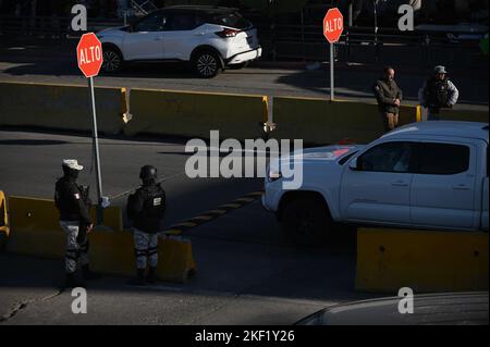 Tijuana, Baja California, Mexico. 15th Nov, 2022. Mexican immigration authorities along with national and municipal officers patrol a new checkpoint to prevent travelers crossing by car without valid documentation (a task currently performed by United States border officials) to prevent asylum seekers from driving into U.S. soil at the San Ysidro Port of Entry from Tijuana to San Diego, California on Tuesday, November 15, 2022. The pilot program started today with both the U.S. and Mexico cooperating in what has seen the nation's role increase even further in helping the control of mig Stock Photo