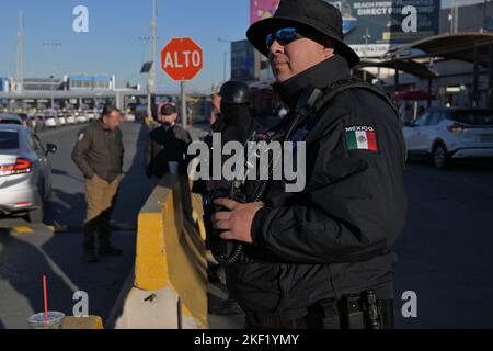 Tijuana, Baja California, Mexico. 15th Nov, 2022. Mexican immigration authorities along with national and municipal officers patrol a new checkpoint to prevent travelers crossing by car without valid documentation (a task currently performed by United States border officials) to prevent asylum seekers from driving into U.S. soil at the San Ysidro Port of Entry from Tijuana to San Diego, California on Tuesday, November 15, 2022. The pilot program started today with both the U.S. and Mexico cooperating in what has seen the nation's role increase even further in helping the control of mig Stock Photo