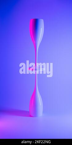 Two champagne glasses stacked against neon background. New Year's Eve celebration cyberpunk concept. Stock Photo