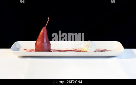 Poached Pears in Red Wine Stock Photo