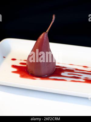 Poached Pears in Red Wine Stock Photo