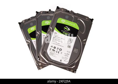A stack of three hard drives Stock Photo