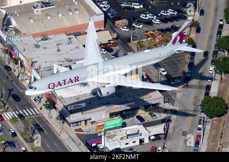 Qatar Airways Airbus A350 aircraft flying. Airplane A350-1000 model of QatarAirways airline A7-ANK. Plane of Qatar from above. Stock Photo