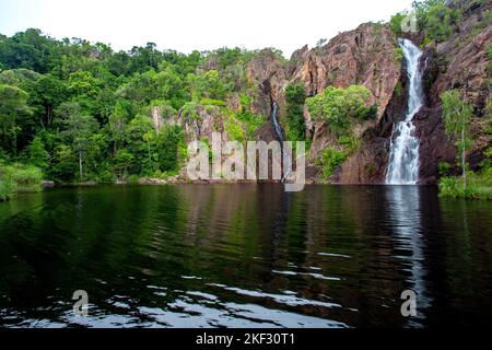 Wangi Falls is a segmented waterfall into a plunge pool on the Wangi Creek, located in Litchfield National Park, Northern Territory, Australia Stock Photo