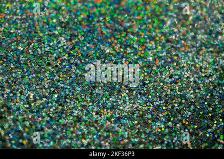 Full frame macro image of a green color sparkling glitter texture background Stock Photo