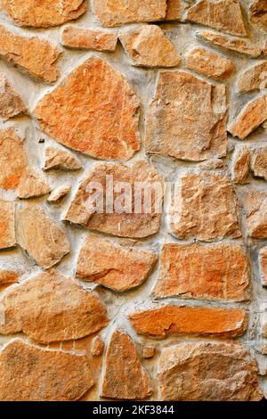 Stone wall, Texture of a stone wall. Stone wall texture background, rock wall. Stock Photo