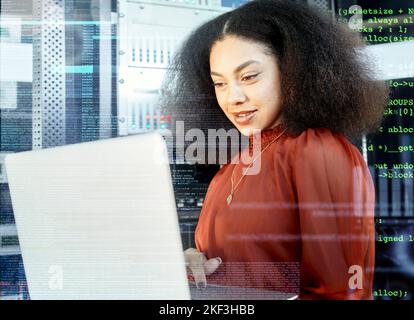 Data overlay, black woman with laptop in server room and future of digital software in cloud computing career. Computer coding language, working with Stock Photo