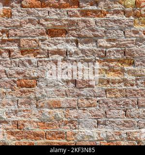 Old brick wall with red brick background, Concrete crack, vintage wall background Stock Photo