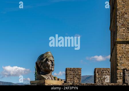The bust of Dante Alighieri at Poppi castle, Arezzo, Italy, against a beautiful sky Stock Photo