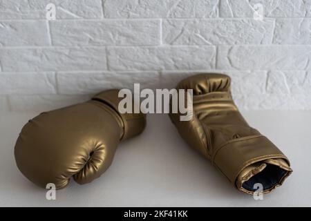 Pair of leather boxing gloves isolated on white Stock Photo