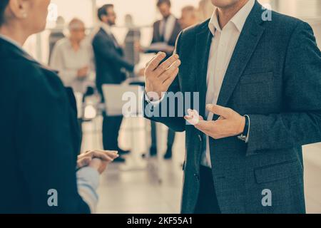 close up. two employees discussing work issues. Stock Photo