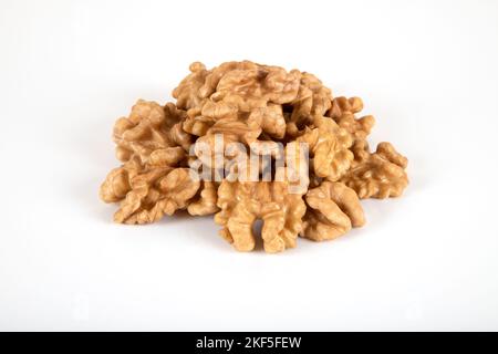 A group of peel walnuts on a white background Stock Photo