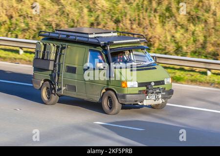 1994 90s nineties, Green Expedition VW Volkswagen Transporter 800KGVBVN 1.9L 1896cc Diesel campervan with snorkel exhaust and exterior storage for Jerry fuel cans. Stock Photo