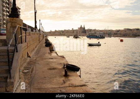 Sliema, Malta - November 12, 2022: Dock in Sliema with a view to Valletta waterfront Stock Photo