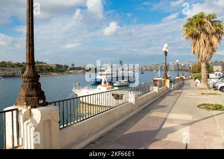 Sliema, Malta - November 12, 2022: Waterfront promenade on early morning Stock Photo