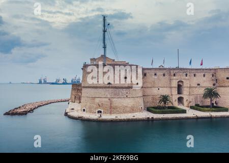 Aragonese Castle of Taranto and revolving bridge on the channel between Big and Small sea. Puglia, Italy. Stock Photo