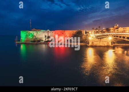 Aragonese Castle of Taranto and revolving bridge on the channel between Big and Small sea. Puglia, Italy. Stock Photo