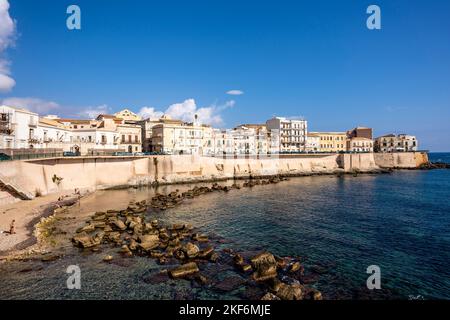 A Beach and Views On The Island of Ortigia, Syracuse (Siracusa), Sicily, Italy Stock Photo