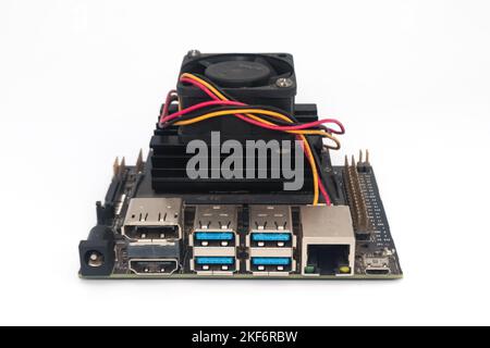 Front view of a mini pc with a dc fan on its GPU on a white background. Stock Photo