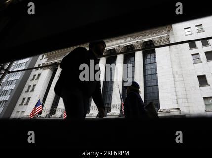 New York, United States. 16th Nov, 2022. Pedestrians walk past the New York Stock Exchange on Wall Street in New York City on Wednesday, November 16, 2022. Photo by John Angelillo/UPI Credit: UPI/Alamy Live News Stock Photo