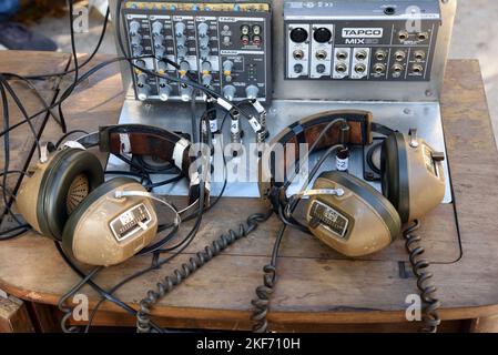 Vintage Headphones and TAPCO Mix Audio Mixing Console or Recording Equipment Stock Photo