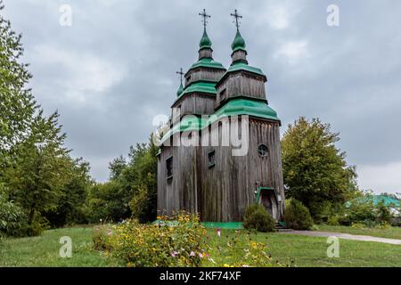 An old wooden church n Pyrohovo museum of folk architecture in Kyiv, Ukraine. Stock Photo