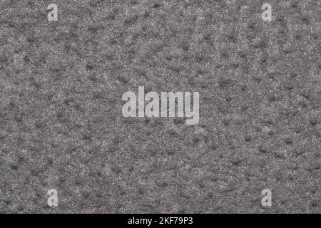 Color swatch sample, solid gray clothing material item. Background textile section with copy space. Stock Photo