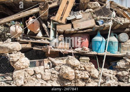 Heraklion, Crete, Greece, September 28 2021: A day after the catastrophic earthquake 5,8 magnitude at the town of Arkalochori. Collapsed stone wall fr Stock Photo