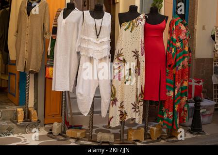 colorful women's clothes , summer women's clothes sold in resorts , ethnic women clothes Stock Photo