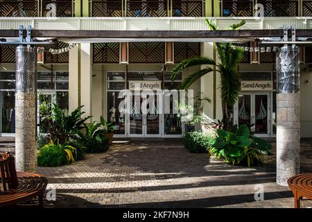 Grand Cayman, Cayman Islands, Aug 2022, view of a modern building with Sand Angels, a cloth store in Camana Bay Stock Photo