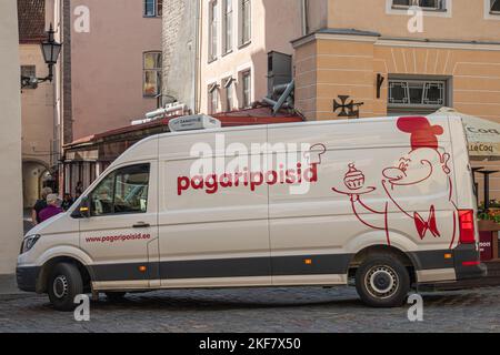 Estonia, Tallinn - July 21, 2022: Closeup of red on white pagarispoisid, baker boys, delivery van Stock Photo