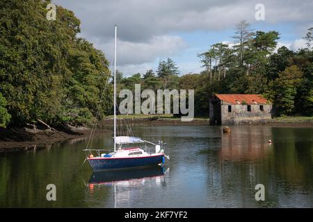 A sailing boat anchored at Westport Harbour, county Mayo, Ireland Stock Photo