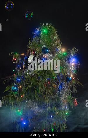 cannabis Christmas tree, hemp christmas, weed christmas tree, copy space, dark background Stock Photo