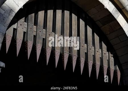 portcullis with metal spikes on a medieval gate castle in cologne Stock Photo
