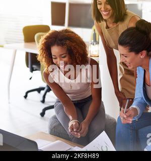 Getting the project off the ground. three businesswomen working together in an office. Stock Photo