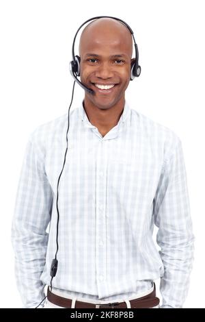 Customer support with a smile. Studio portrait of an smiling african american man wearing a telephone headset. Stock Photo