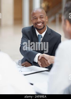 I look forward to working with you. Two business executives reaching an agreement. Stock Photo